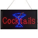 A white rectangular LED sign with "Cocktails" and a martini glass in lights.