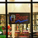 A lit up rectangular LED sign that says "Beer" with a beer and a glass of beer.