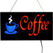 A white rectangular LED sign that says "Coffee" in blue and red text with a blue coffee cup and white steam above it.
