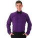 A man wearing a Henry Segal purple tuxedo shirt with a black bow tie.