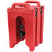 A red plastic Cambro Camtainer with black handles.