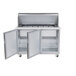 A Traulsen stainless steel refrigerated sandwich prep table with two open doors.