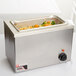A stainless steel APW Wyott countertop food warmer with a tray of vegetables inside.