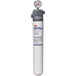 A 3M water filtration cylinder with a gauge on top.