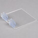 A clear plastic tray with two plastic clips.