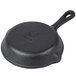 An American Metalcraft pre-seasoned mini cast iron skillet with a handle.