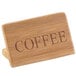 A Cal-Mil bamboo wood sign with the word "Coffee" on it.