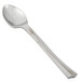 A close-up of a WNA Comet Reflections stainless steel look plastic tasting spoon with a long handle.