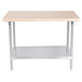 An Advance Tabco wood top work table with a stainless steel base and undershelf.