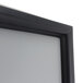 A close-up of a black frame with a white background.