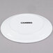 A white Cambro ceramic plate with a white rim.