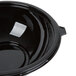 A black Fineline PET plastic bowl.