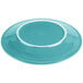 A turquoise plate with a white rim.