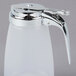 A clear plastic Tablecraft dispenser with a chrome lid.