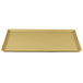 A rectangular tan Cambro dietary tray with a gold finish.