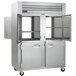 A large Traulsen stainless steel reach-in refrigerator with two open doors.