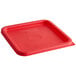 A red square Cambro polyethylene food storage container lid on a red plastic container.