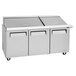 A Turbo Air 72" 3 door stainless steel refrigerated sandwich prep table.
