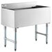 A Regency stainless steel underbar ice bin with a cold plate and bottle holders on a counter.