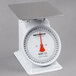 A Cardinal Detecto T50 mechanical portion scale with a white body, red top, and orange base.
