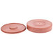 Two red HS Inc. polyethylene lids on a circular tortilla server.