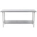 A silver Advance Tabco stainless steel work table with an undershelf.