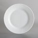 A white 10 Strawberry Street porcelain dinner plate with a white rim.