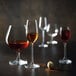 A group of Chef & Sommelier cordial wine glasses on a table.