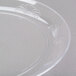 A clear plastic WNA Comet Designerware plate with a design on it.