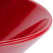 A close-up of a red GET Red Sensation melamine bowl.