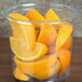 A clear Bare by Solo deli container filled with oranges.