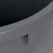 A close-up of a gray Continental plastic bin with a lid.