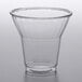 A 9 oz. clear PET parfait cup on a white surface.