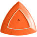 A white rimmed triangle shaped Tuxton Concentrix papaya china plate.