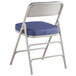 A blue Lancaster Table & Seating folding chair with a 2" padded seat.