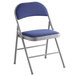 A Lancaster Table & Seating blue fabric folding chair with a padded seat on a metal frame.