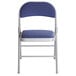 A blue folding chair with a gray frame and padded seat.
