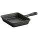 A black rectangular cast iron skillet with a handle.