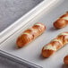 A tray of J & J Snack Foods Bavarian Bakery Mini Soft Pretzel Sticks.