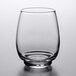 A close up of a Libbey stackable beverage glass with a round bottom.