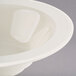 A white Homer Laughlin China bowl with a white rim.