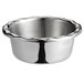 A silver Vollrath stainless steel bowl with a ruffled edge.