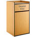 A wooden Lancaster Table & Seating waste receptacle enclosure with a "THANK YOU" swing door.