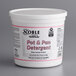 A white container of Noble Chemical QuikPacks Concentrated Pot & Pan Detergent with a pink label and white lid.