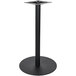 A black metal BFM Seating bar height round table base on a black pole.