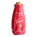 A red bottle of Torani Puremade Peppermint Bark Flavoring Sauce.
