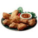 A plate of Brakebush Honey Touched Fully Cooked Battered Chicken Wing Drummettes with dipping sauce.