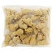 A bag of Brakebush Honey Touched chicken wing drummettes on a white background.