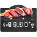 A meat counter with a Choice Butcher Deli Tag on a piece of meat.