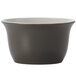 A close up of a Libbey Matte Olive porcelain soup bowl with a white base and black rim.